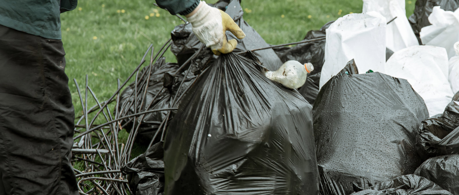Close Up Trash Bags Filled With Trash After Cleaning Environment (1)
