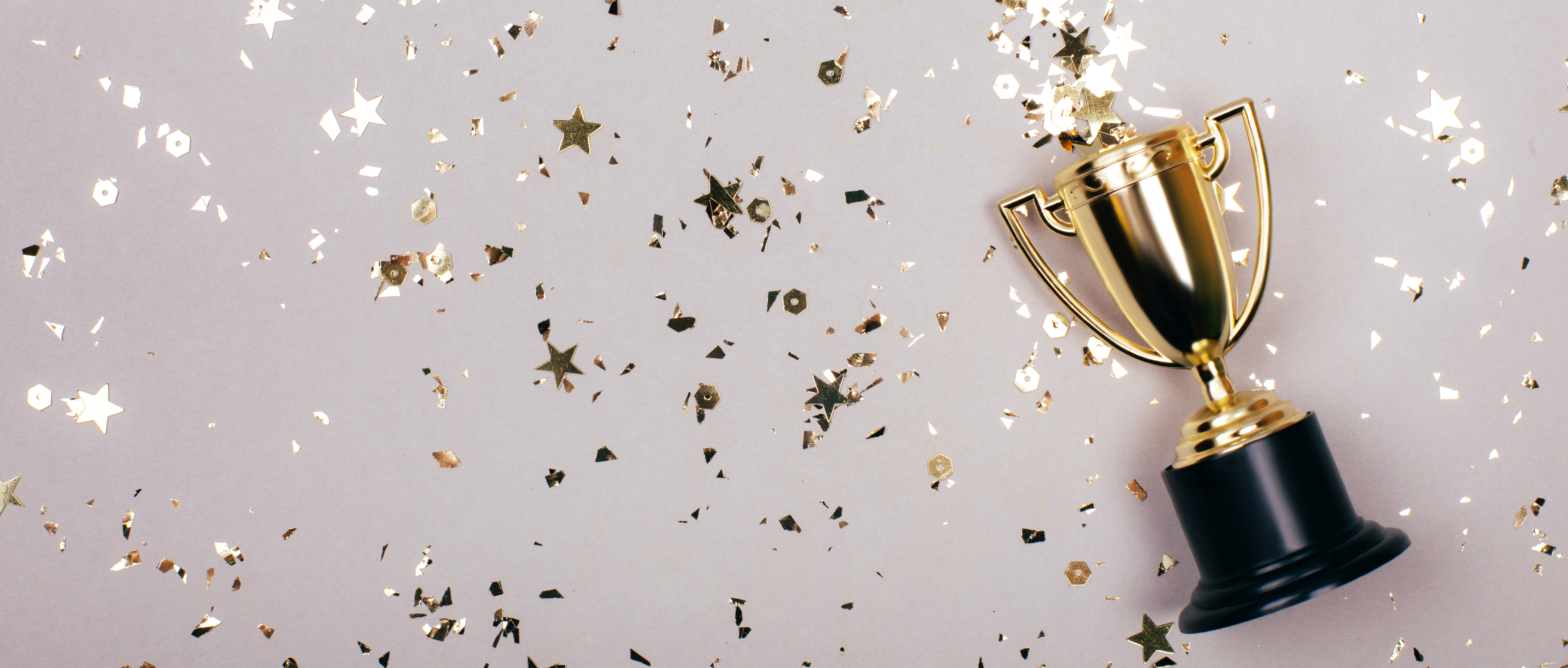 Gold Trophy With Gold Confetti