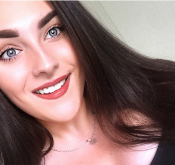 Georgia smiles to camera