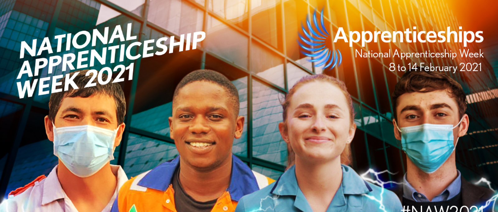Four apprentices in uniforms smile to camera