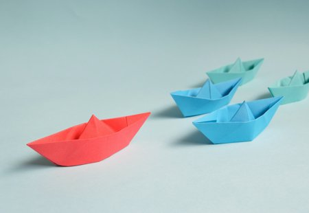 A fleet of paper origami ships