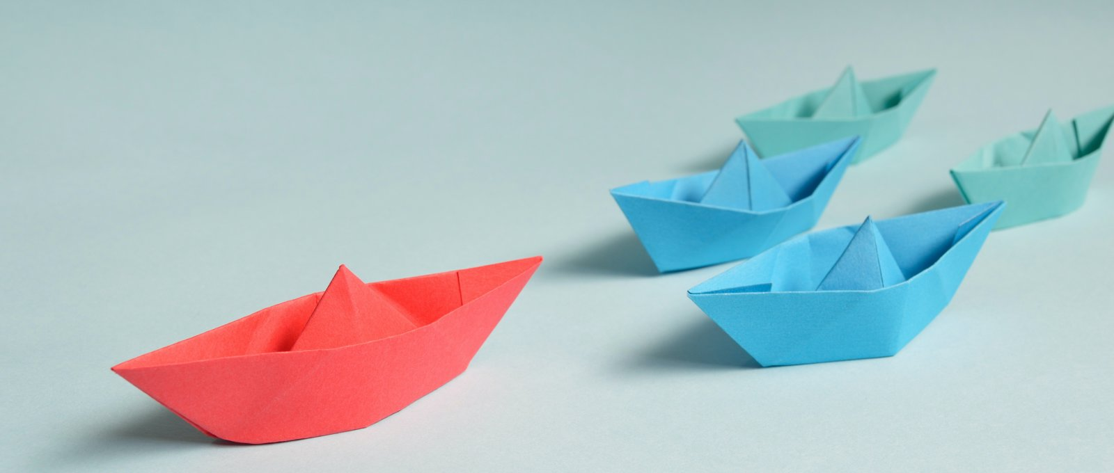 A fleet of paper origami ships