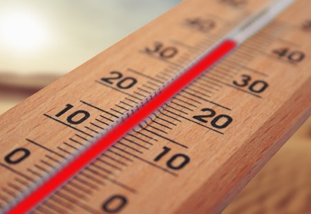 A wooden thermometer 