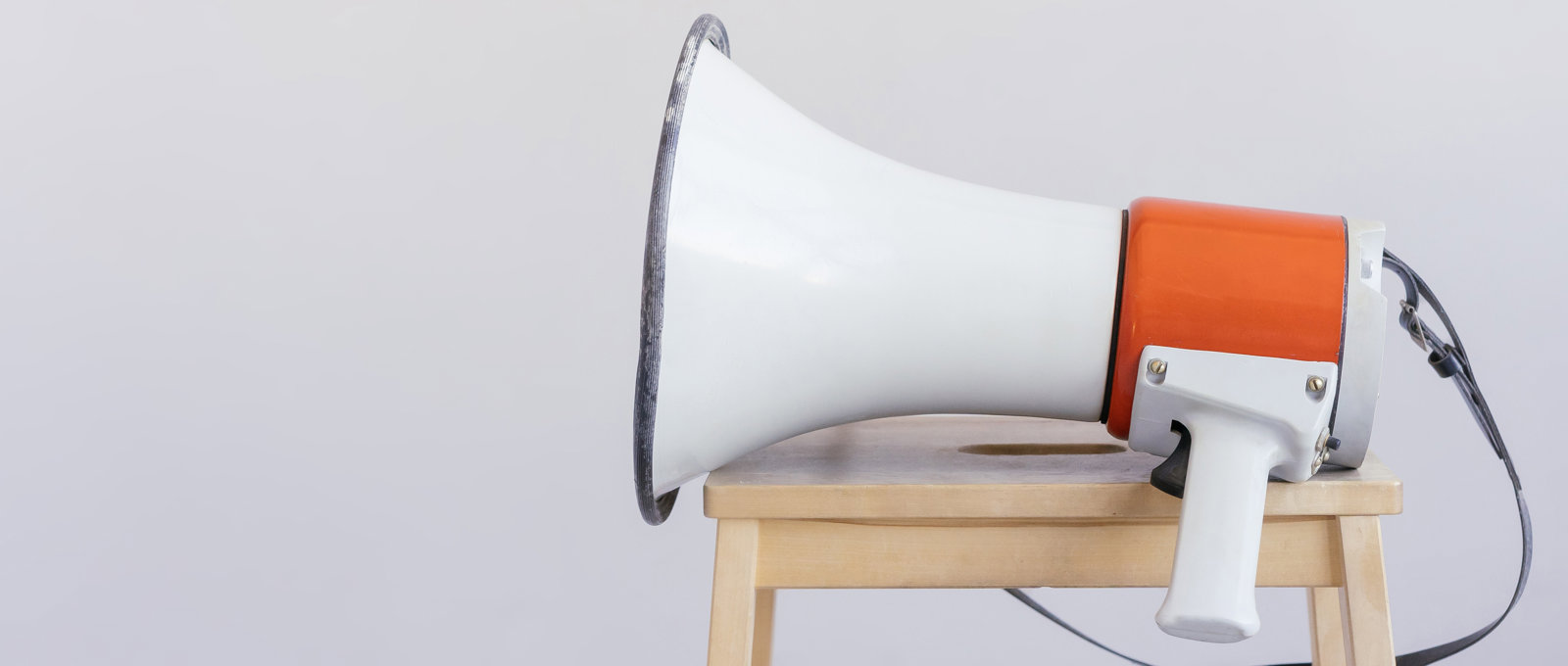 Photograph of a megaphone sitting on a stool