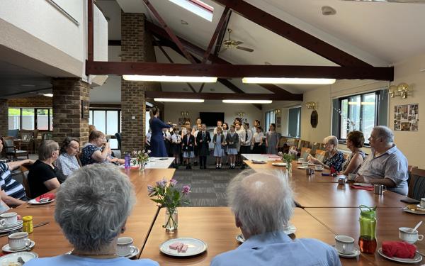 School choir performing for Warwick Court, Daventry customers 5