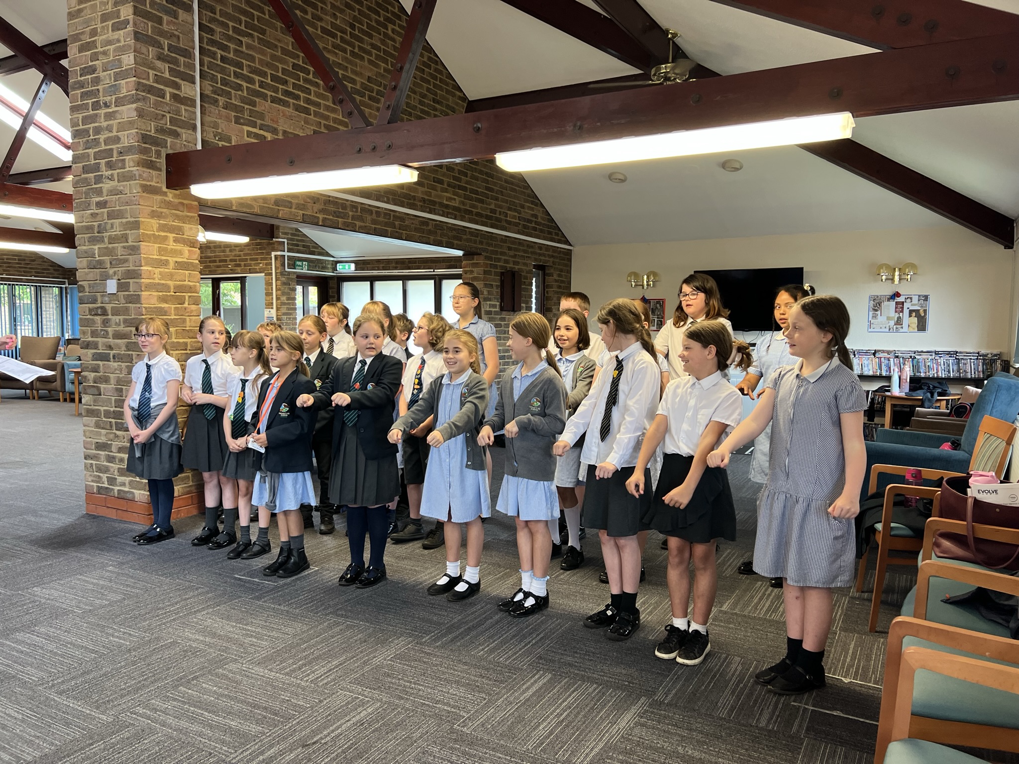 School choir performing for Warwick Court, Daventry customers 19
