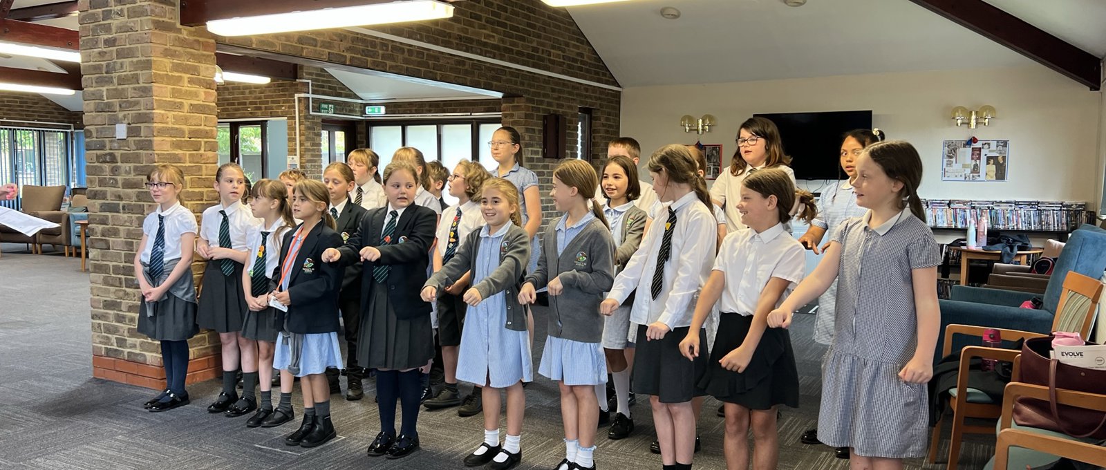 School choir performing for Warwick Court, Daventry customers 19