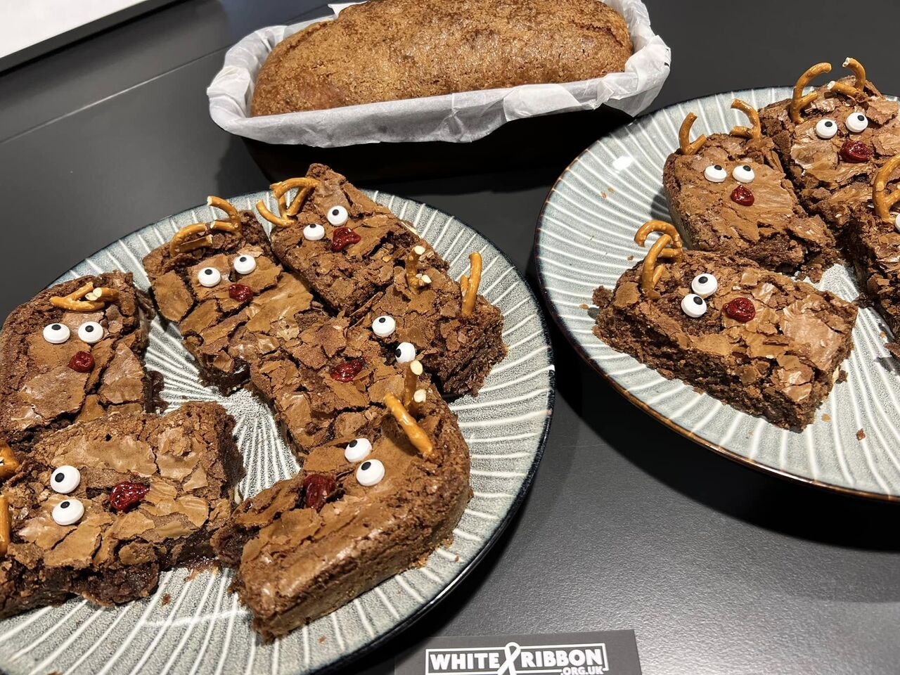 Photo of two plates of reindeer brownies and a banana bread