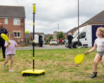 Children playing swingball at Langley Mill event