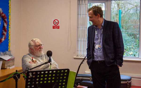 Tim chatting to a local musician