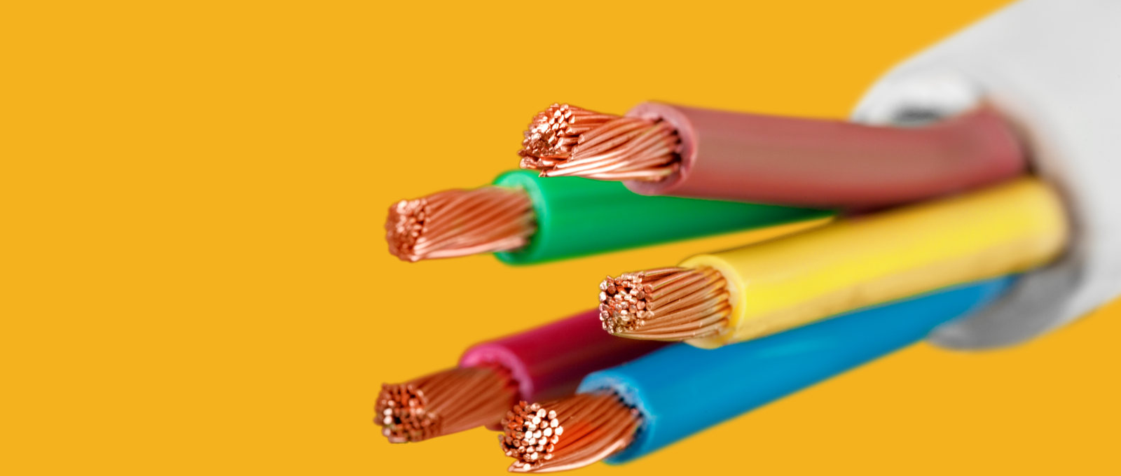 Close up of multiple exposed internal copper wires of an electrical cable
