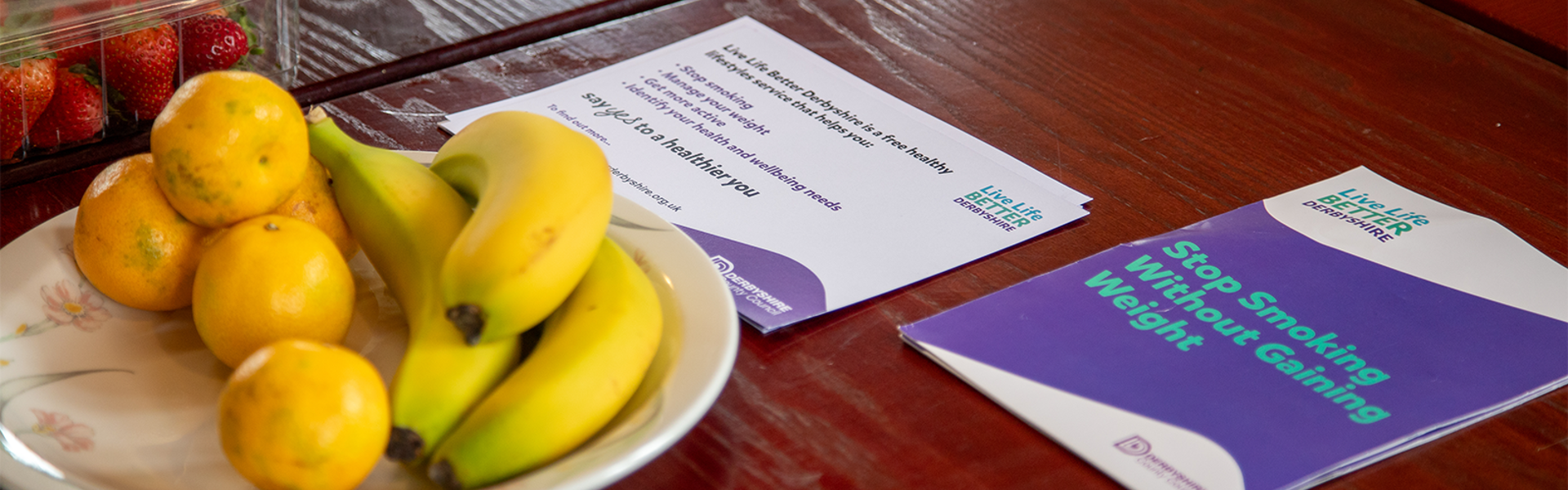 Live Life Better Derbyshire Leaflets On Table With Fruit