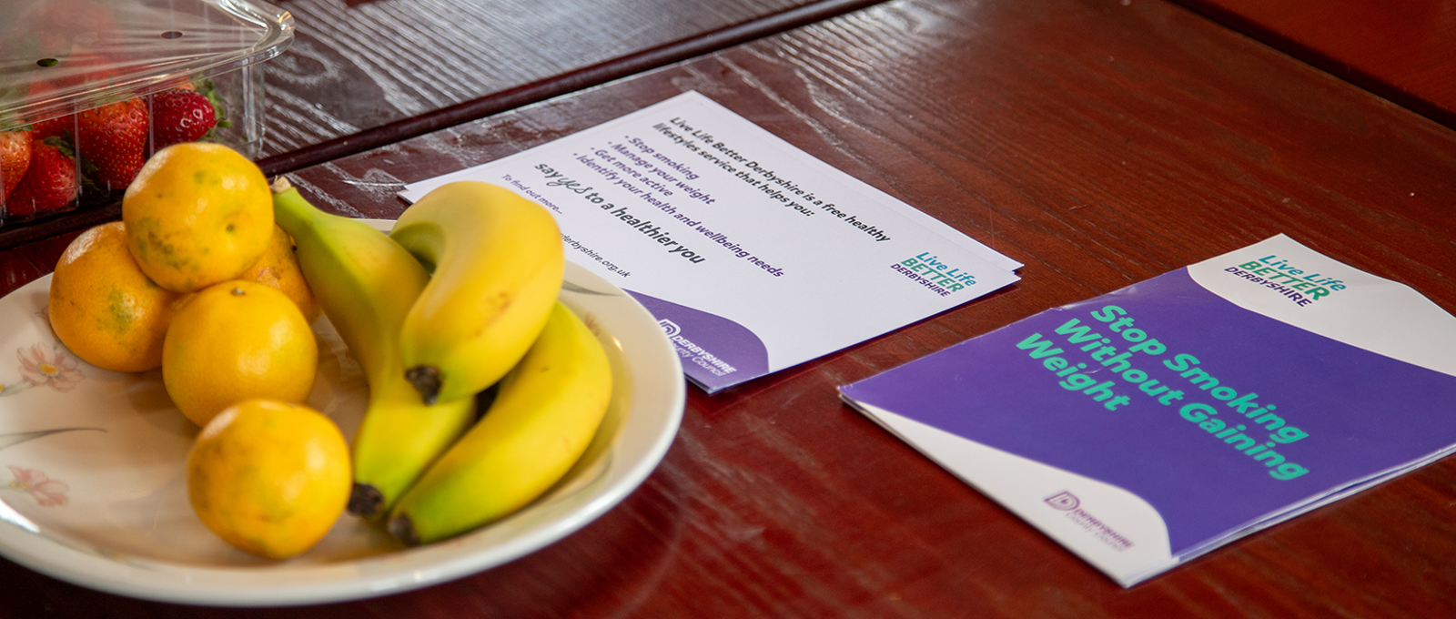 Live Life Better Derbyshire Leaflets On Table With Fruit