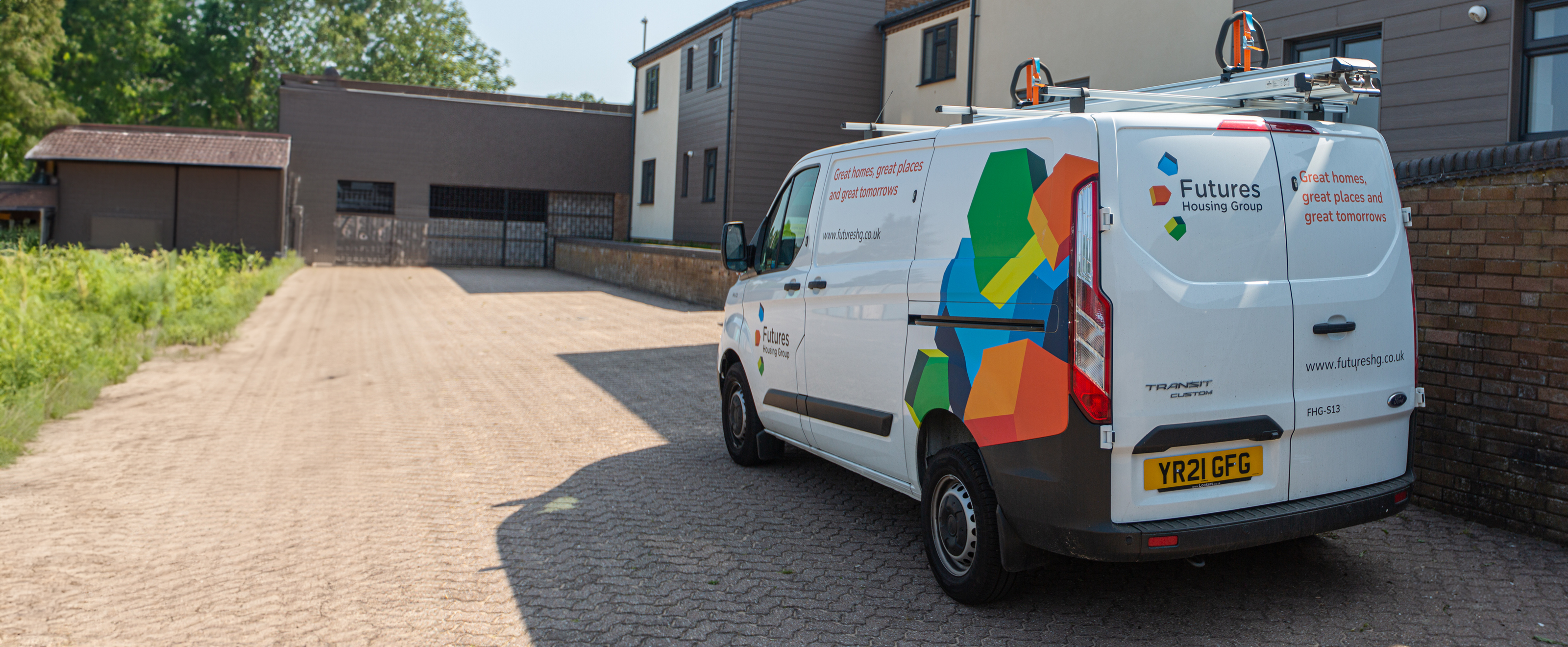 Futures van parked outside a building
