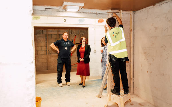 Futures colleague plastering ceiling