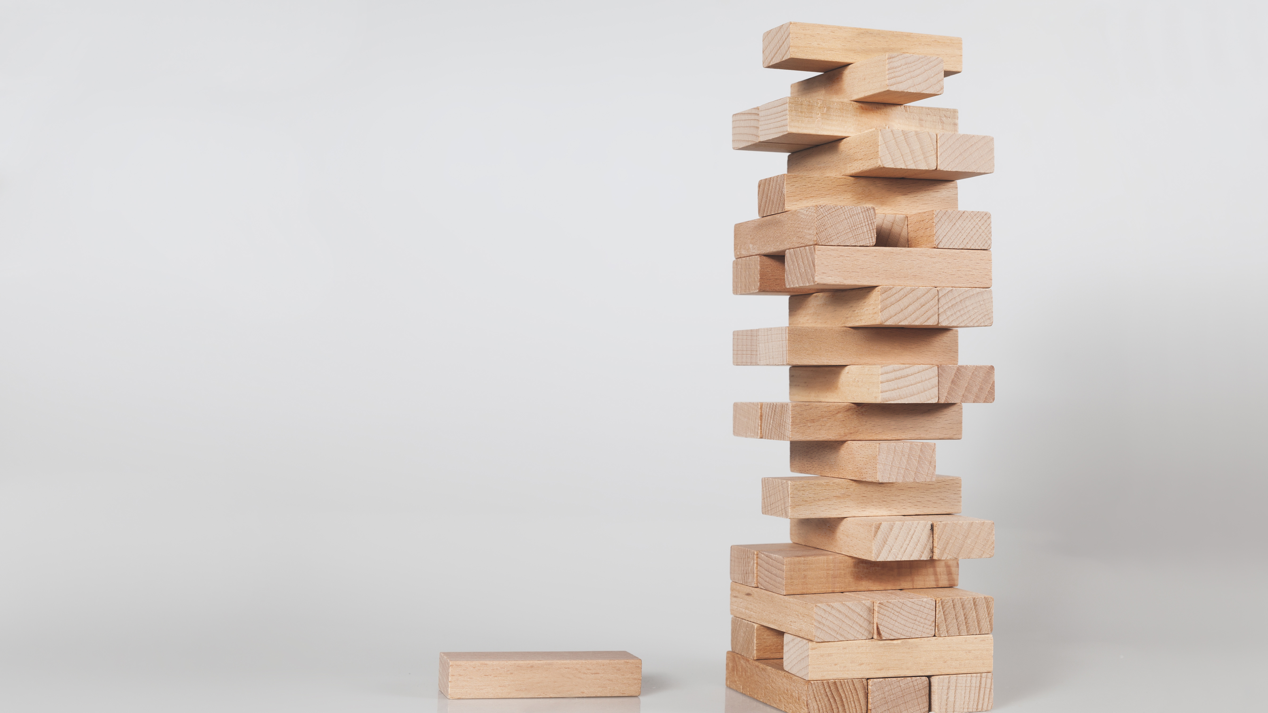 Tower of small wooden bricks