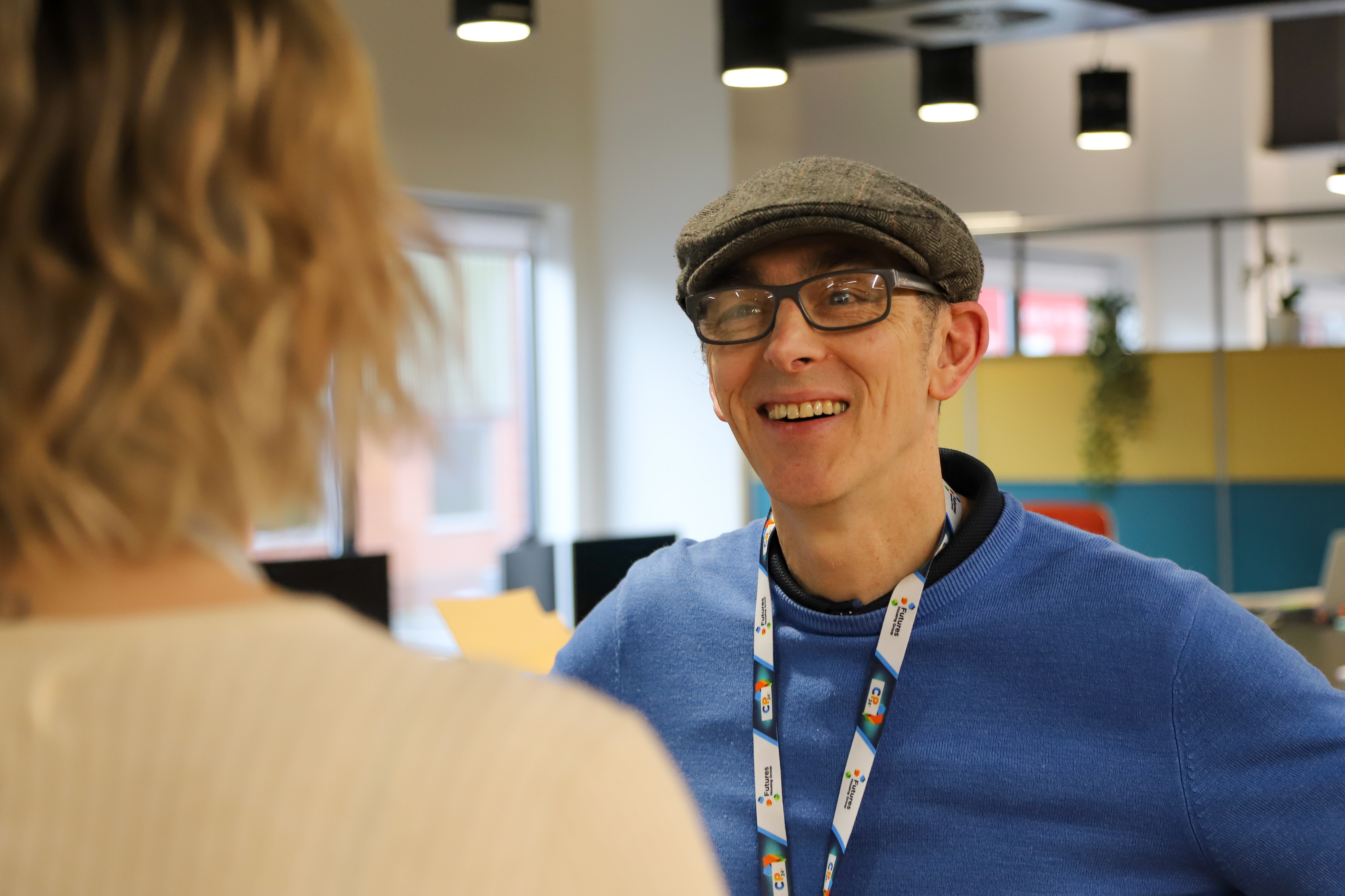 Mick talks to a colleague at Futures House.