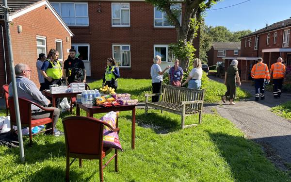Customers at a community day of action event in Pennytown, Somercotes