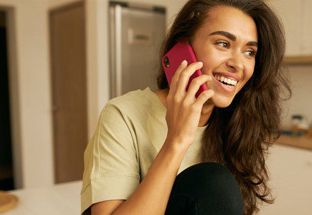 Woman On Phone In Kitchen Banner