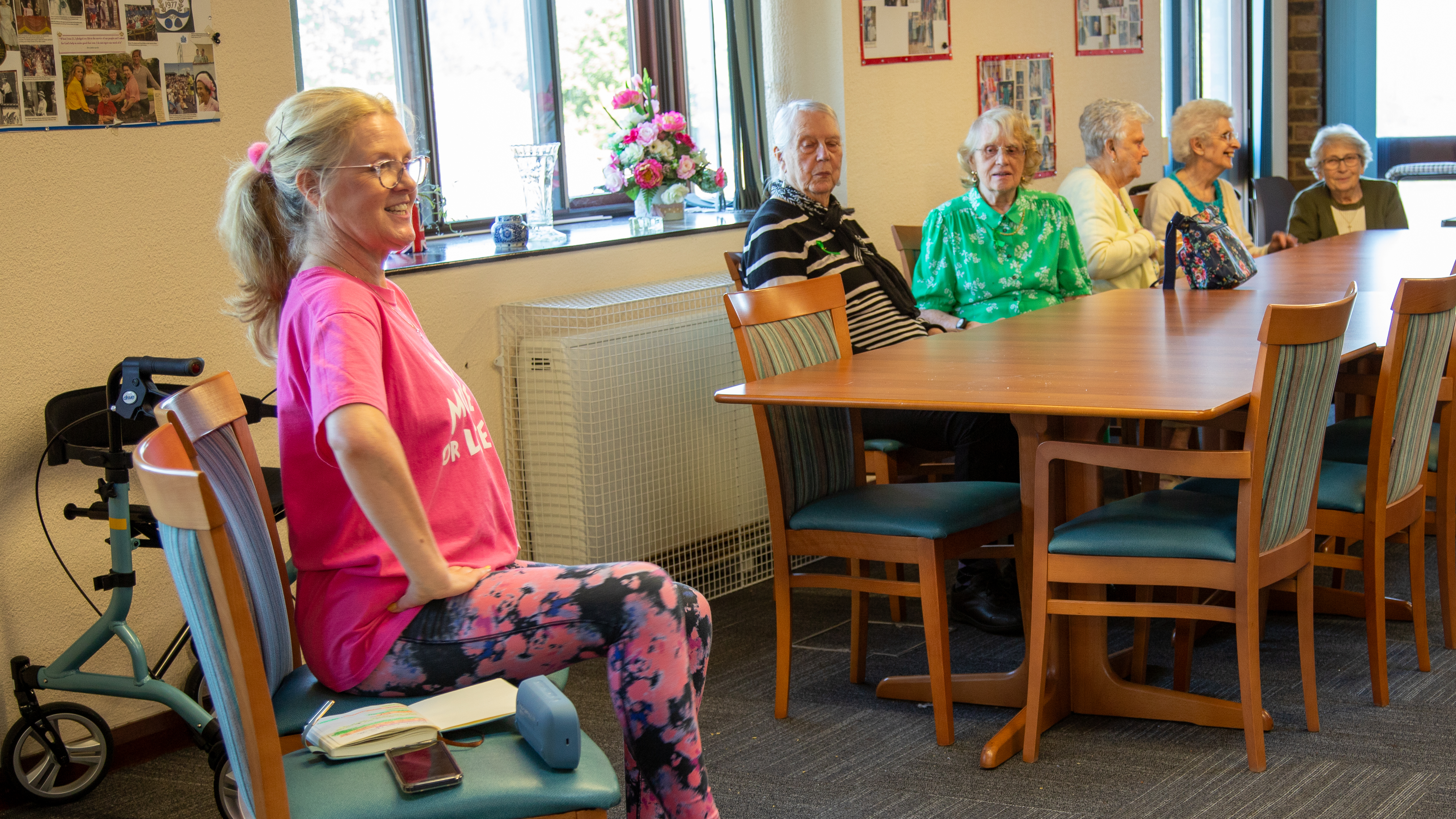 Fitness instructor with customers at Warwick Court