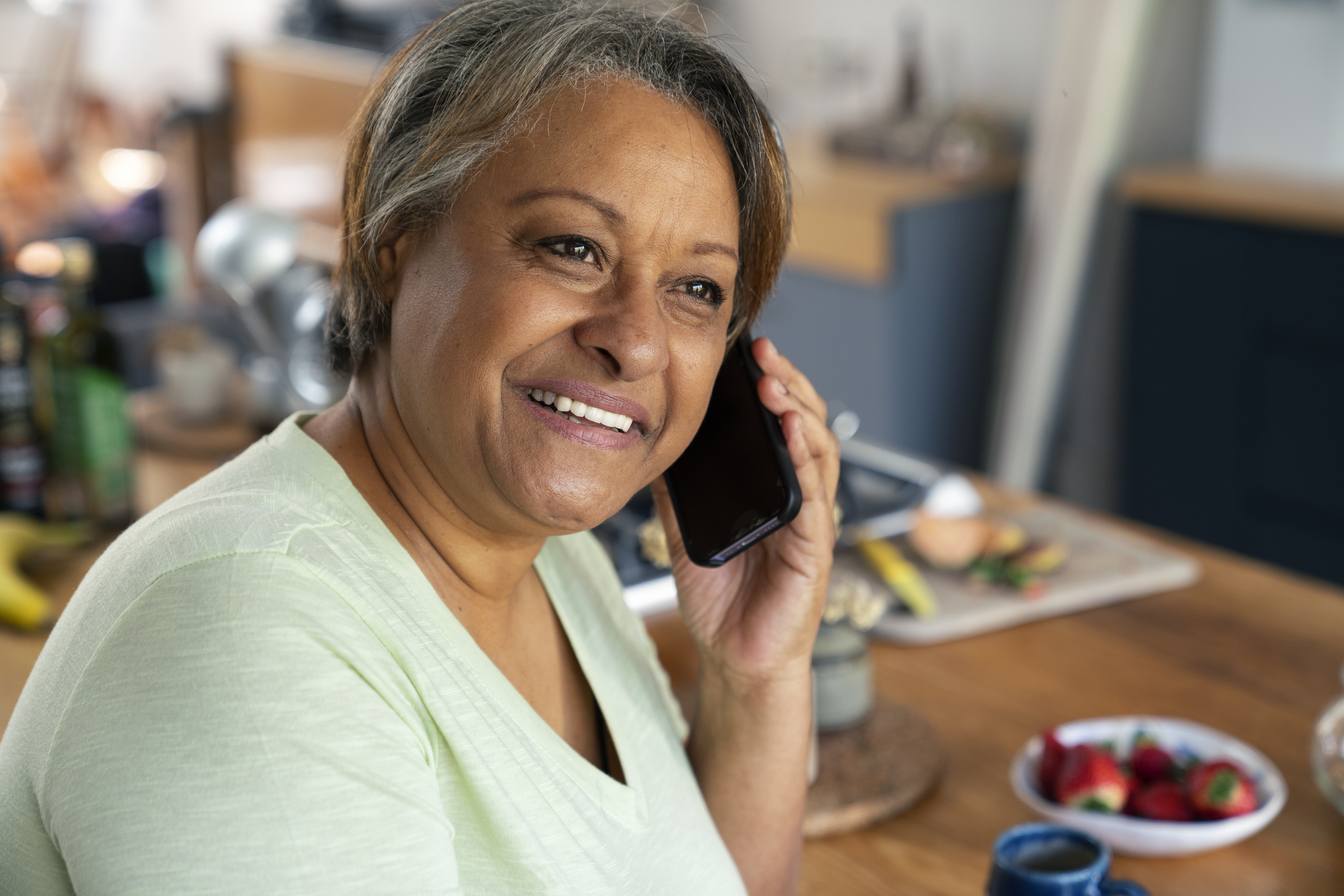 side view woman talking phone