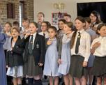 School choir performing for Warwick Court, Daventry customers 10