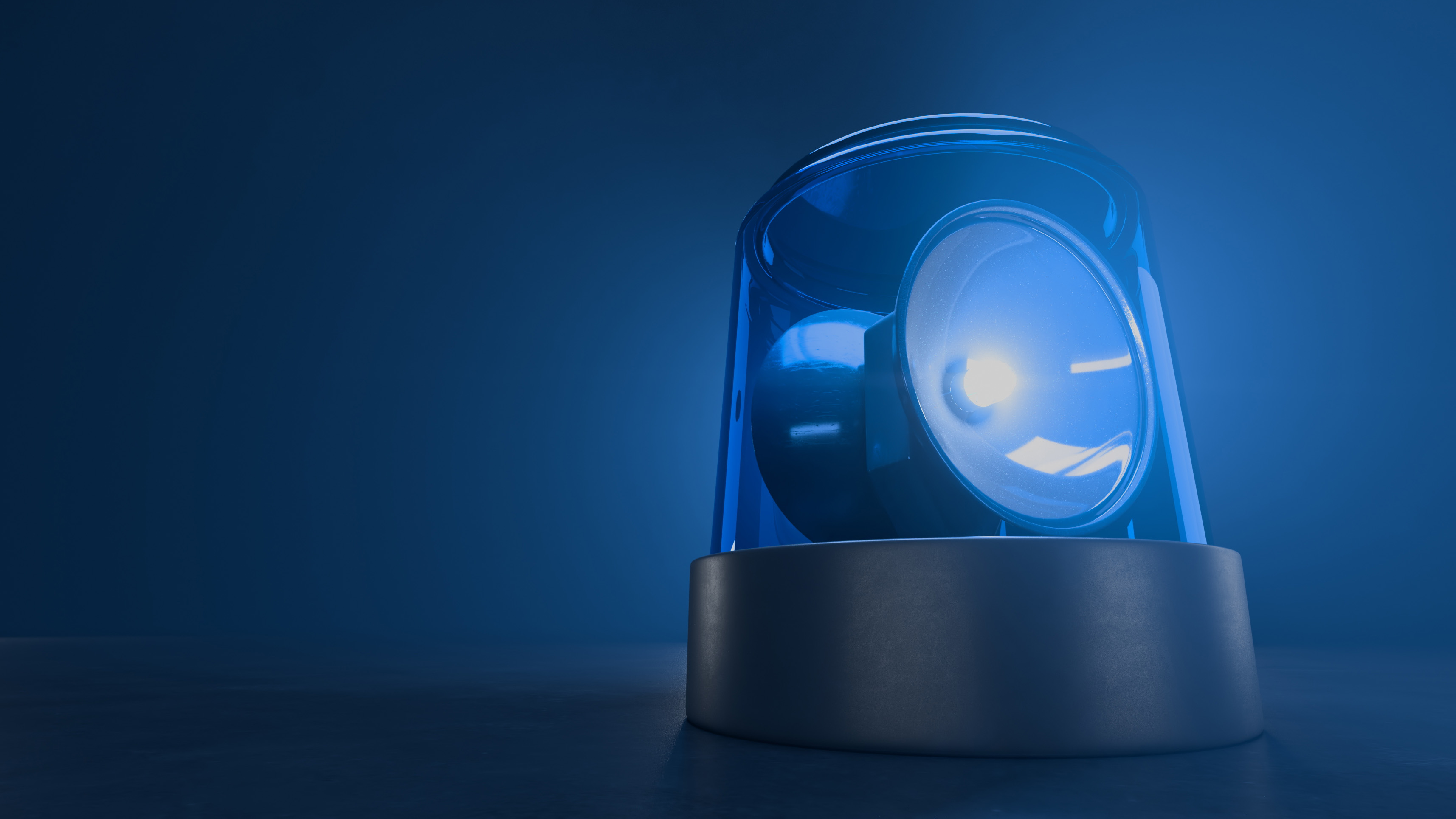 Photo of a blue emergency light of the type that would often be on top of an emergency vehicle