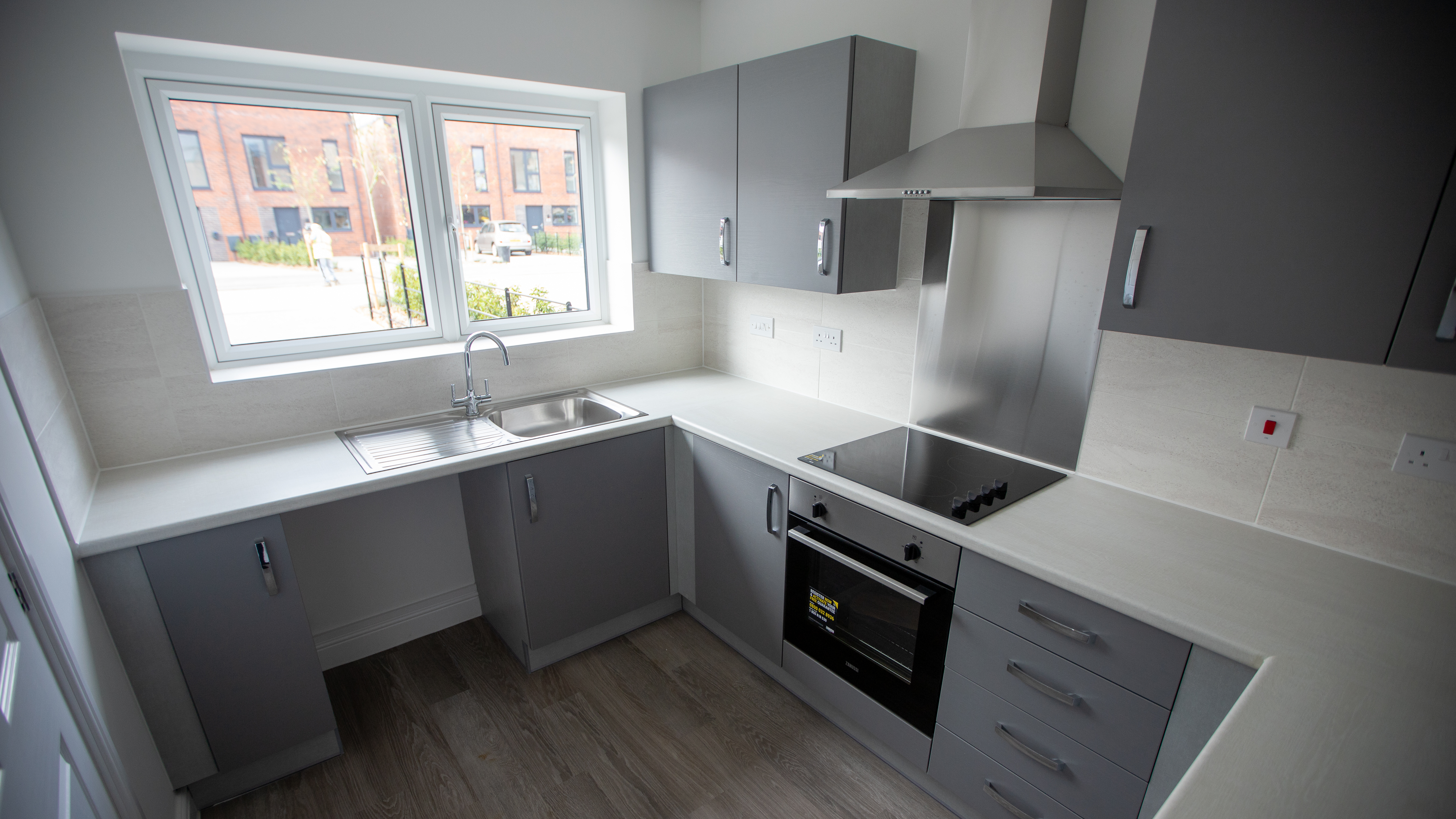 Modern grey and white kitchen in a house