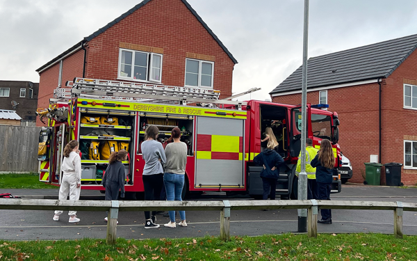 Crowd With Fire Engine