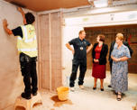 Futures colleague plastering a ceiling